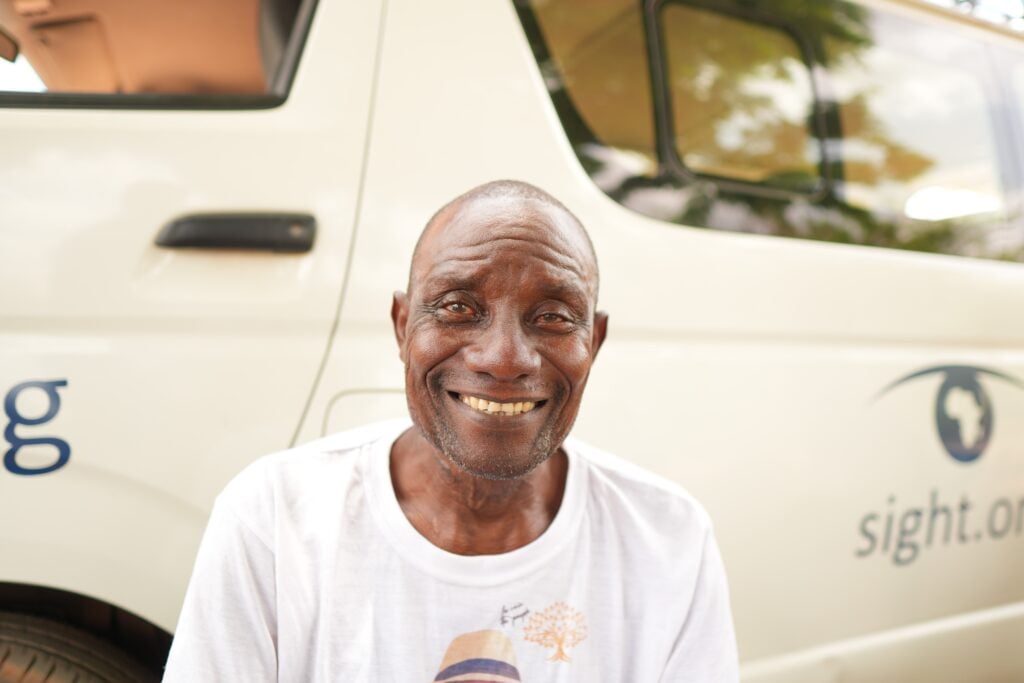 Akakpo smiling after cataract surgery in rural Togo