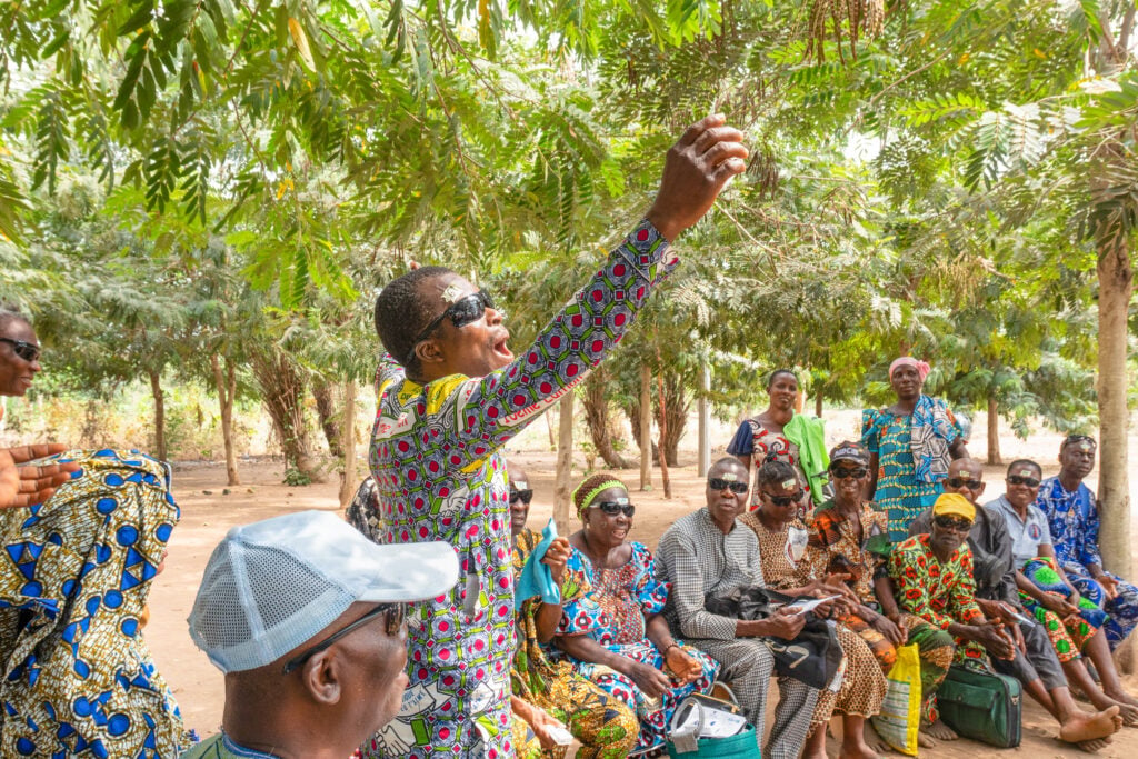 Jean-Brice celebrating after cataract surgery in Togo