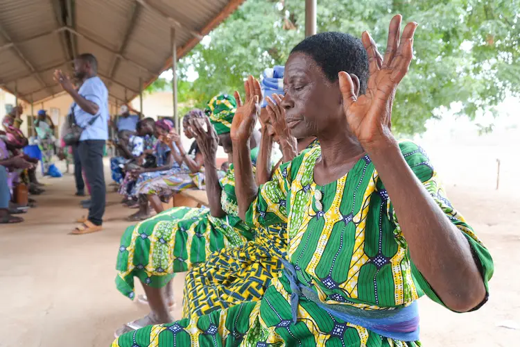 African women praising God after receiving cataract surgery African women praising God after receiving cataract surgery